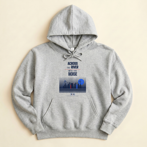 A light sport grey pullover hoodie with a graphic print on the chest reading 'ACROSS THE RIVER INTO THE NOISE' above a blue-toned city skyline illustration with blue basketball shaped moon, laid flat on a warm beige background.