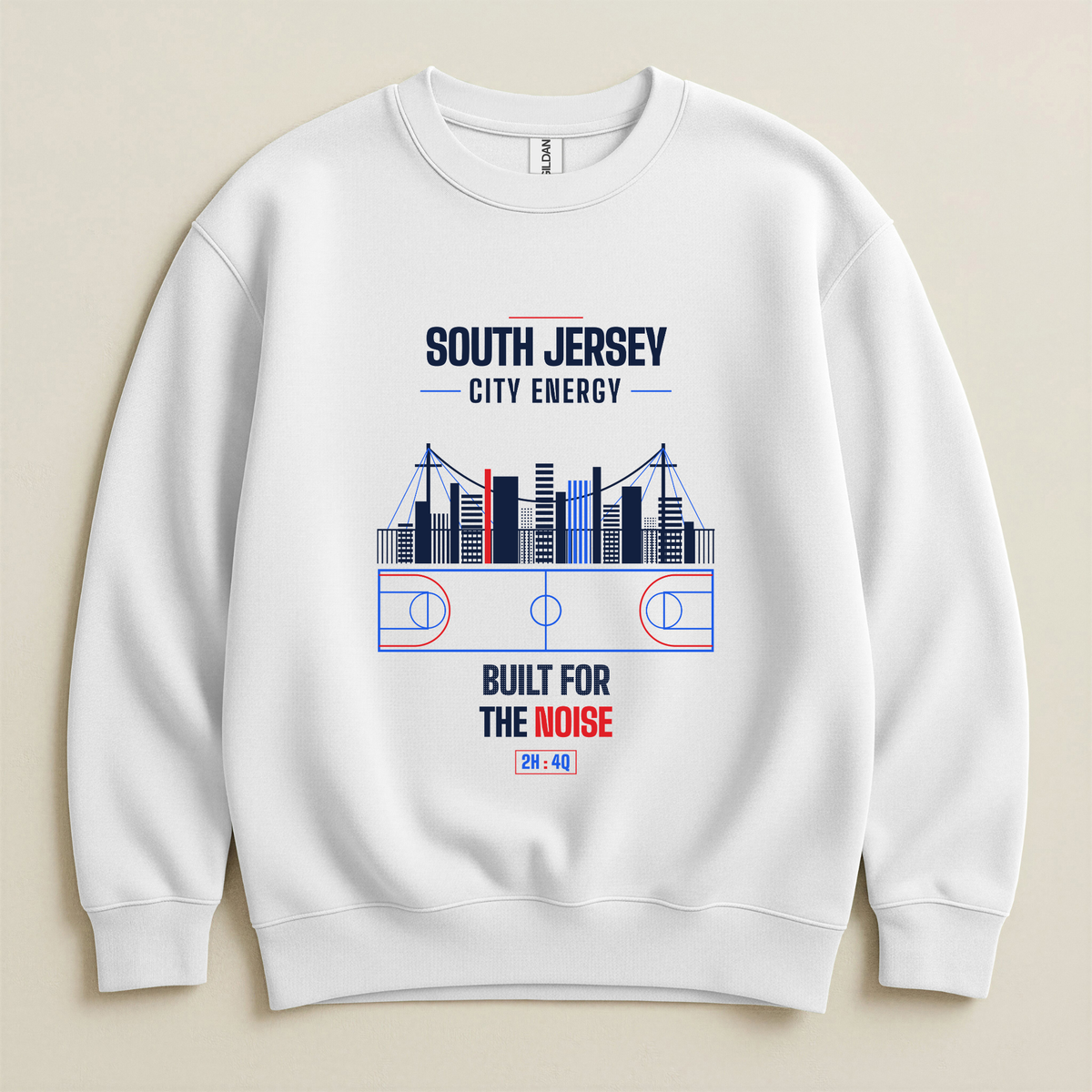 A white crewneck sweatshirt with a graphic print on the front featuring a basketball court design, a city skyline, and the text 'SOUTH JERSEY CITY ENERGY' and 'BUILT FOR THE NOISE'.