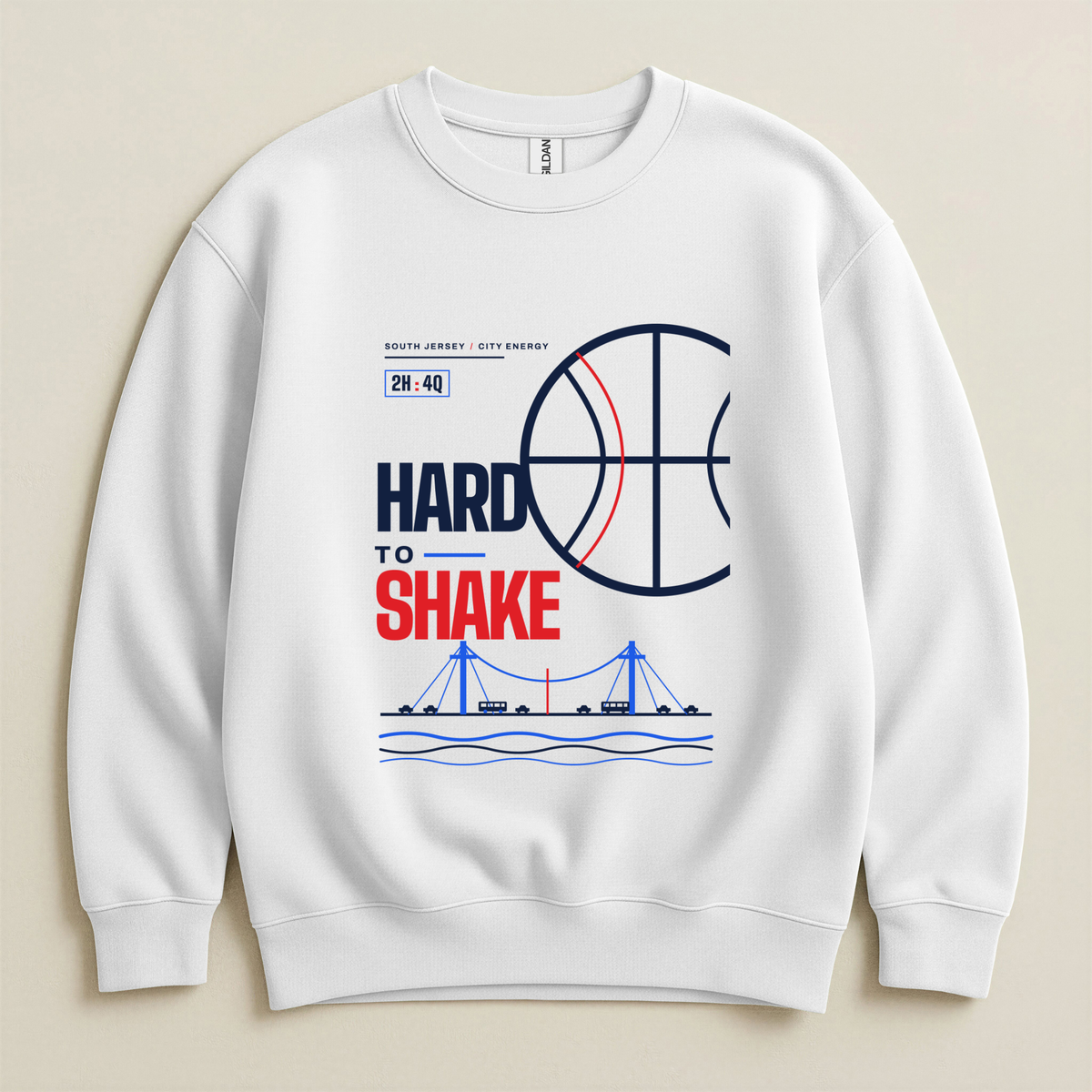 A white crewneck sweatshirt with a graphic print featuring a basketball, the text 'HARD TO SHAKE', a bridge illustration, and 'SOUTH JERSEY / CITY ENERGY' with a '2H: 4Q' time clock. The sweatshirt is displayed flat against a light beige background.